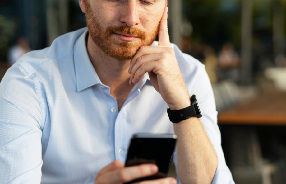 man searching on phone