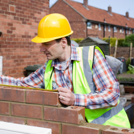 Builder working on an extension